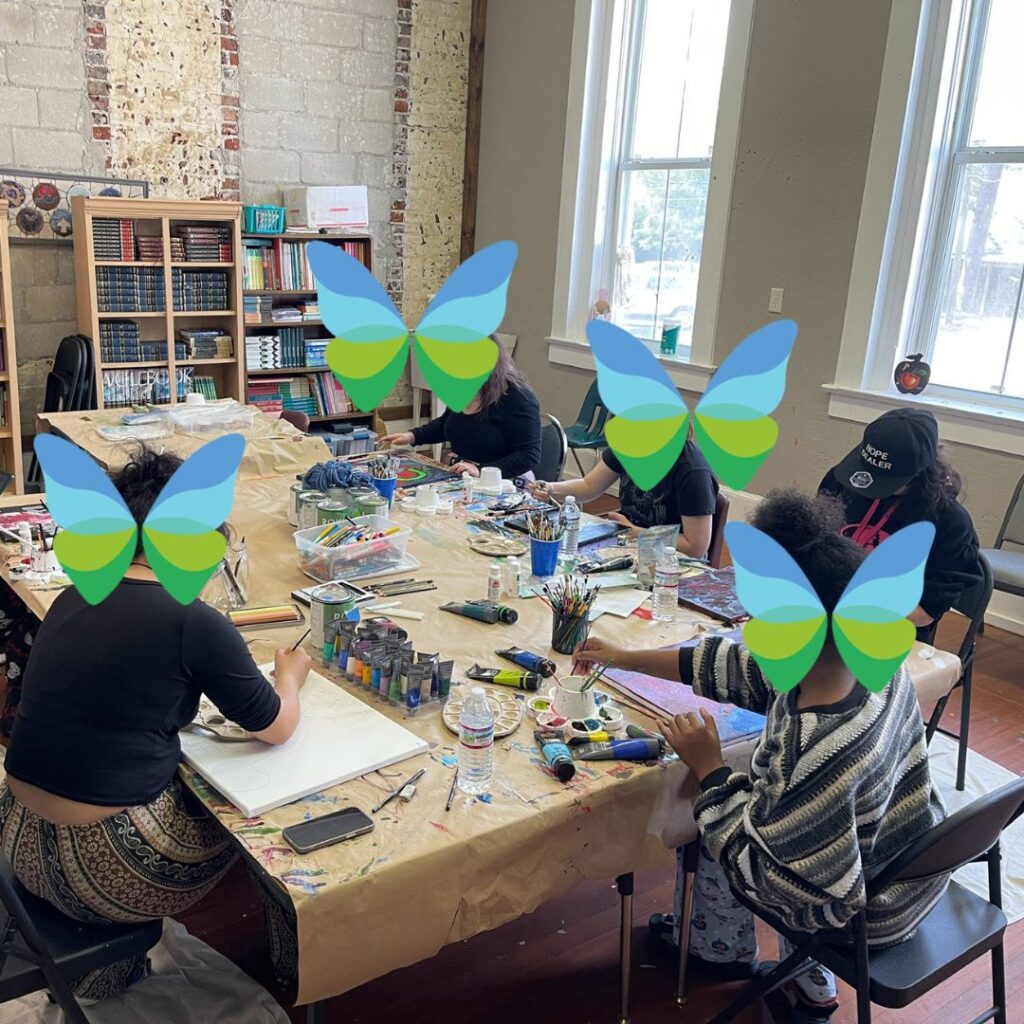 Vashti girls painting in the Bishop Hall art workshop